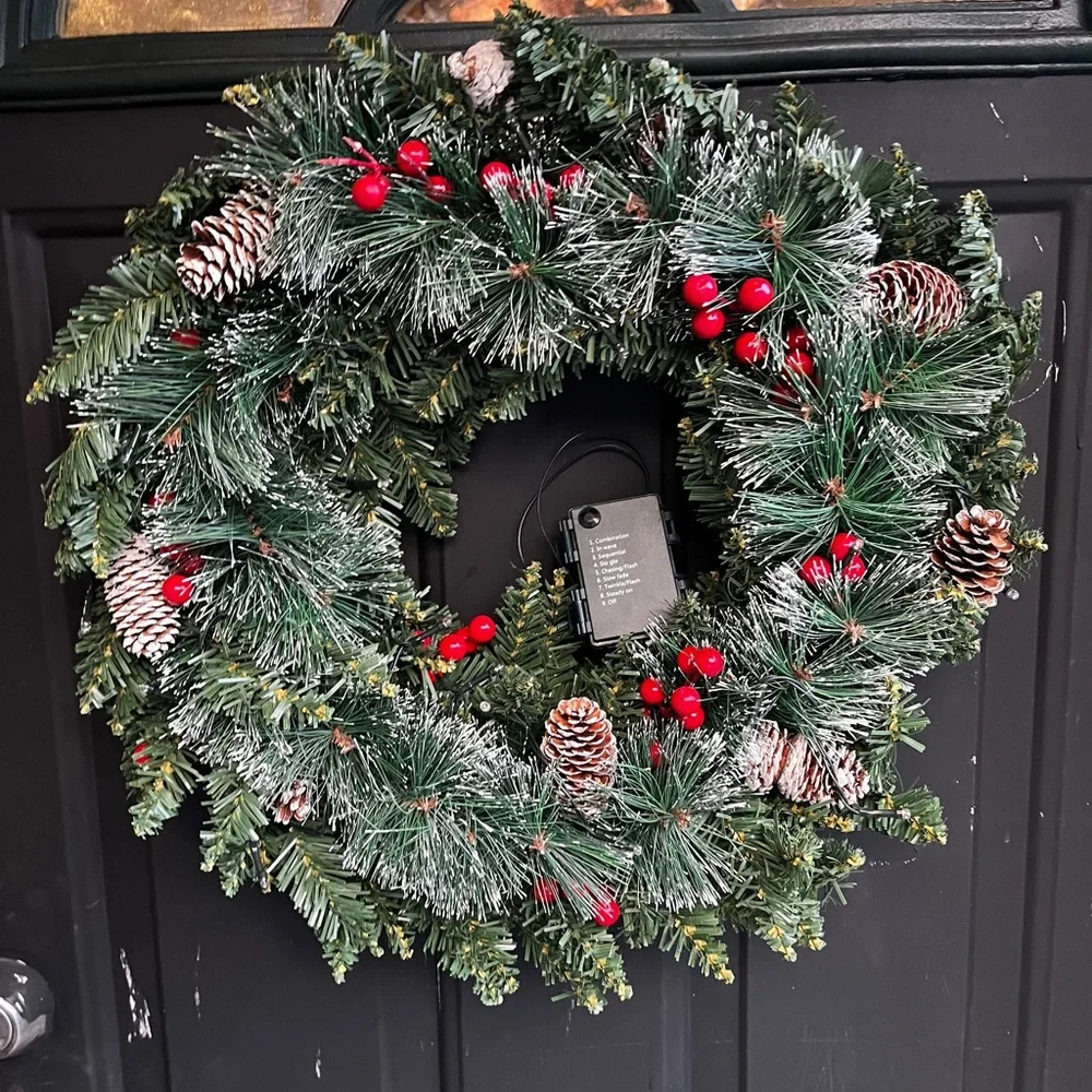 Festive Green Holiday Wreath with Red Accents
